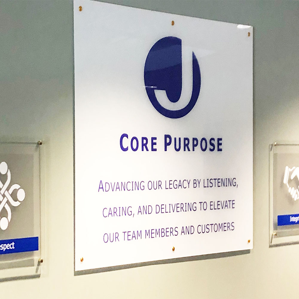 MJS Packaging Core Purposes sign on wall