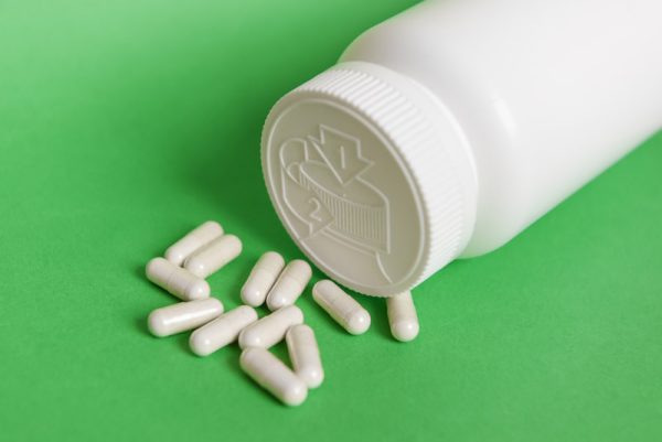 Pharmacy tables next to a container